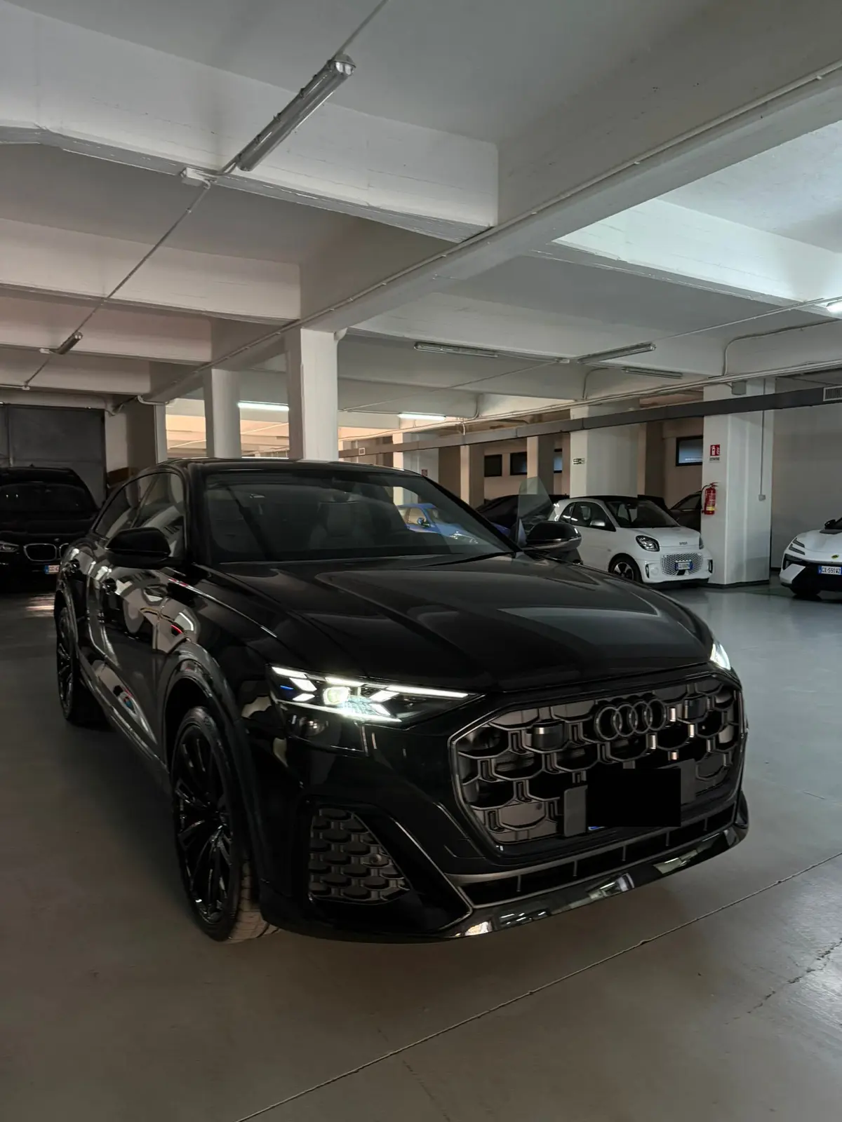 Audi Q8 2025, front view — Marbella Luxury Car Rental, Marbella. The 2025 Audi Q8 carries 340 hp through a cabin built for five, with the kind of weighted…