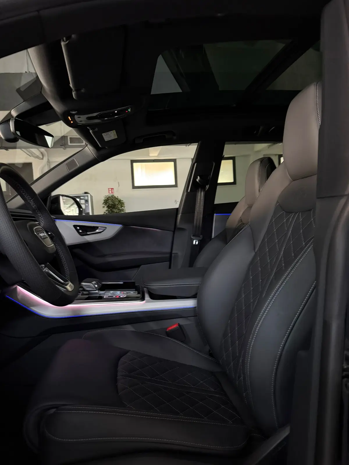 Audi Q8 2025, rear view — Marbella Luxury Car Rental, Marbella. The 2025 Audi Q8 carries 340 hp through a cabin built for five, with the kind of weighted…