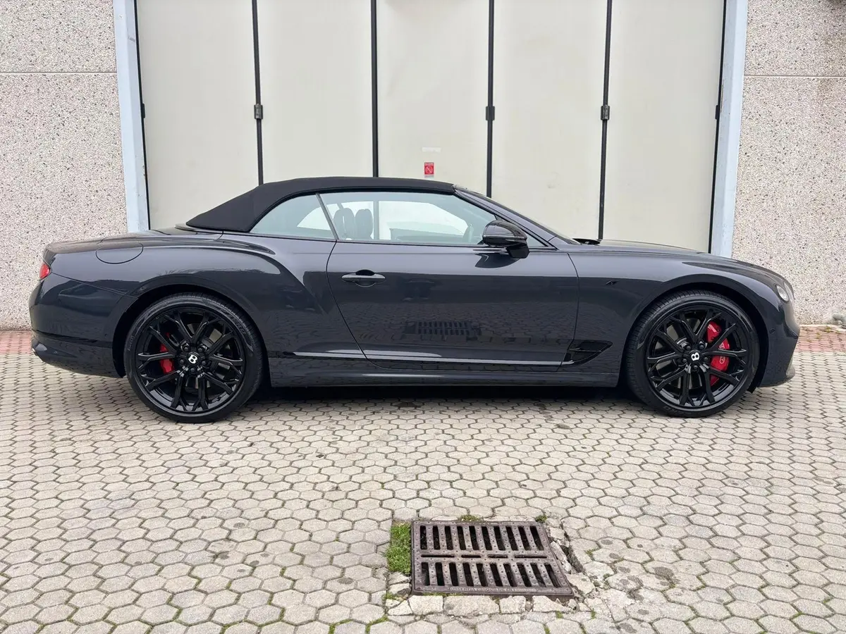 Bentley Continental GTC S V8 2025, rear view — Marbella Luxury Car Rental, Marbella. The Bentley Continental GTC S V8 is a grand tourer built for distance rather than a…