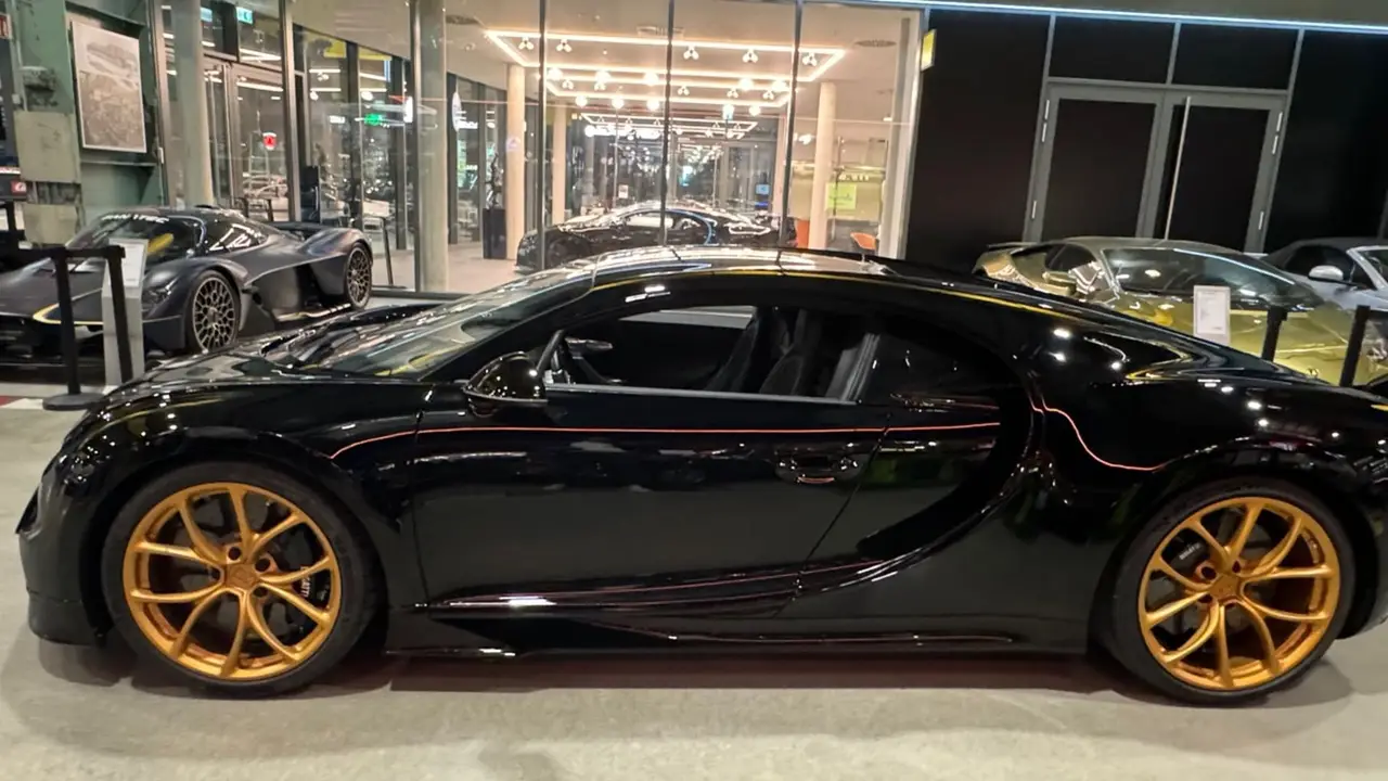 Bugatti Chiron 110 Ani 2019, exterior — Marbella Luxury Car Rental, Marbella. The Bugatti Chiron 110 Ans Bugatti is not a car you drive so much as an event you…
