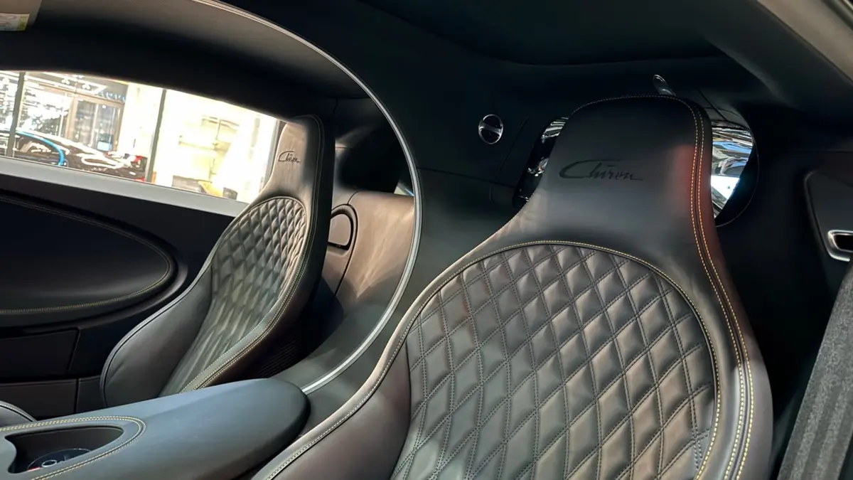 Bugatti Chiron 110 Ani 2019, dashboard — Marbella Luxury Car Rental, Marbella. The Bugatti Chiron 110 Ans Bugatti is not a car you drive so much as an event you…