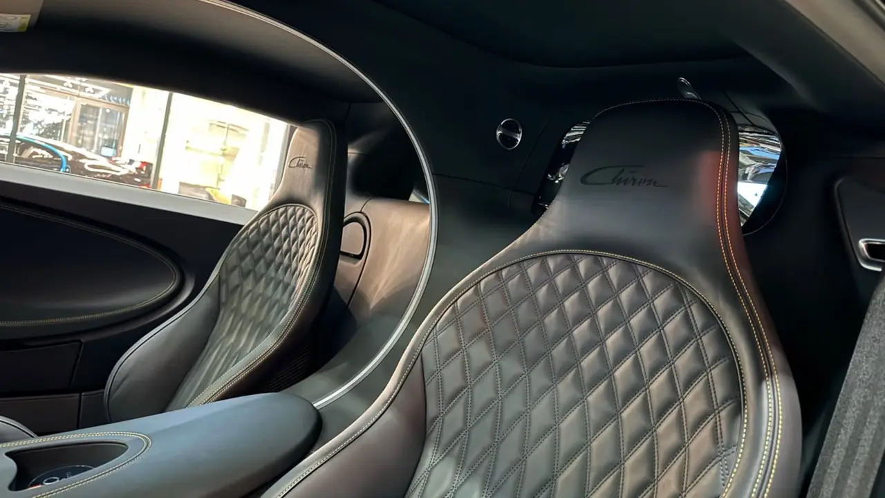 Bugatti Chiron 110 Ani 2019, dashboard — Marbella Luxury Car Rental, Marbella. The Bugatti Chiron 110 Ans Bugatti is not a car you drive so much as an event you…