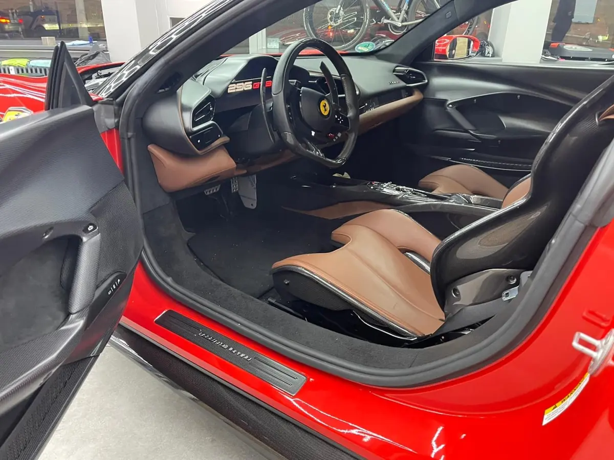 Ferrari 296 GTB 2023, front view — Marbella Luxury Car Rental, Marbella. The Ferrari 296 GTB is built around a two-seat cockpit and 830 hp, numbers that translate…
