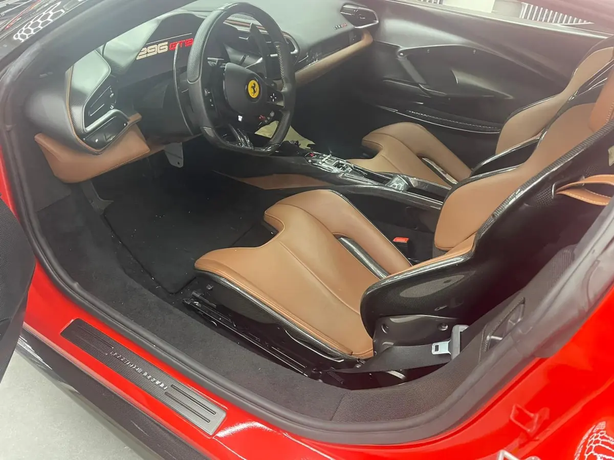 Ferrari 296 GTB 2023, dashboard — Marbella Luxury Car Rental, Marbella. The Ferrari 296 GTB is built around a two-seat cockpit and 830 hp, numbers that translate…
