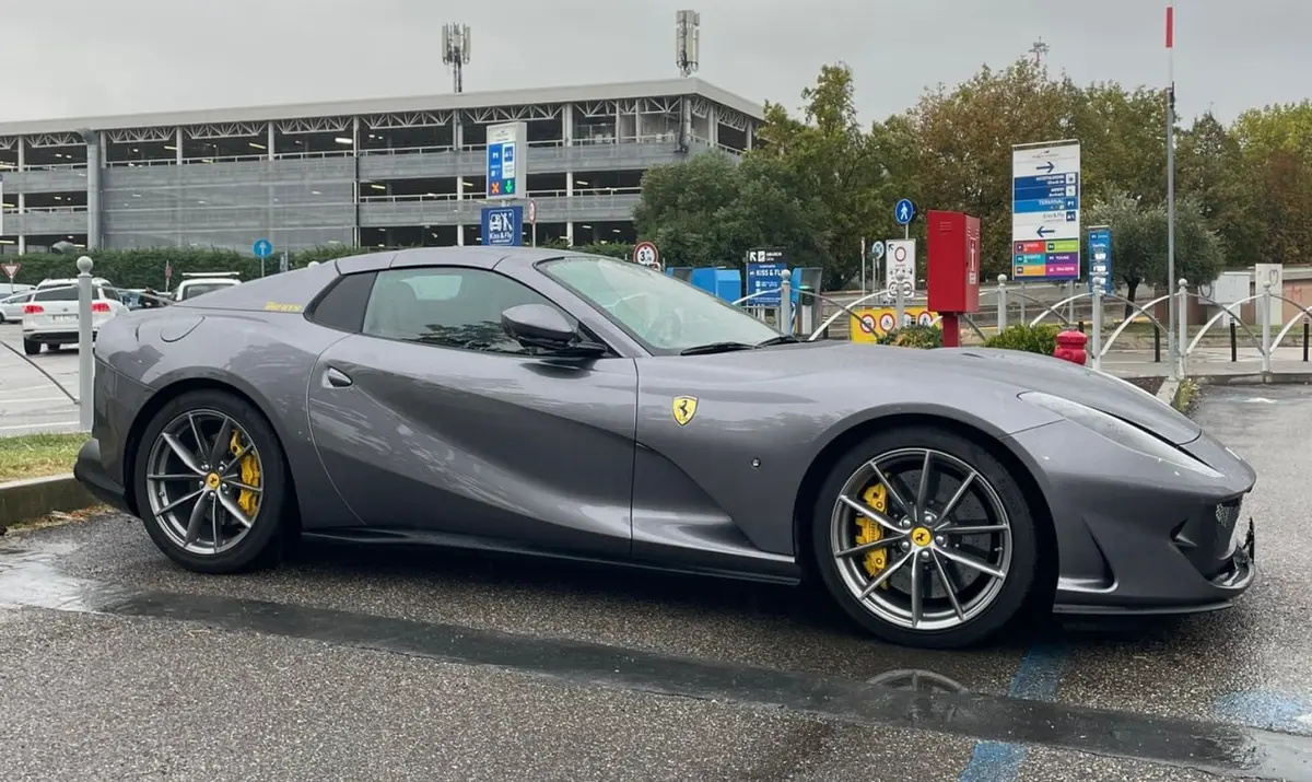 Ferrari 812 GTS 2024, rear view — Marbella Luxury Car Rental, Marbella. The Ferrari 812 GTS pairs an 800 hp naturally aspirated V12 with a folding hard top, a…