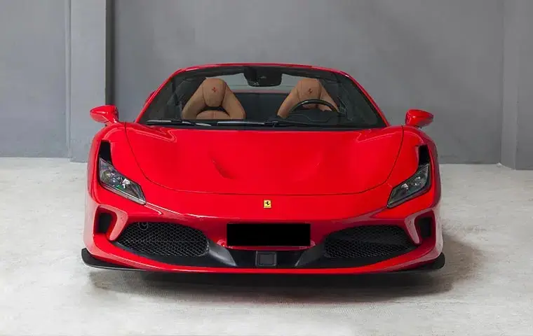 Ferrari F8 Tributo Spider Red 2023, front view — Marbella Luxury Car Rental, Marbella. The Ferrari F8 Tributo Spider pairs 720 hp with a retractable hard top, which means the…