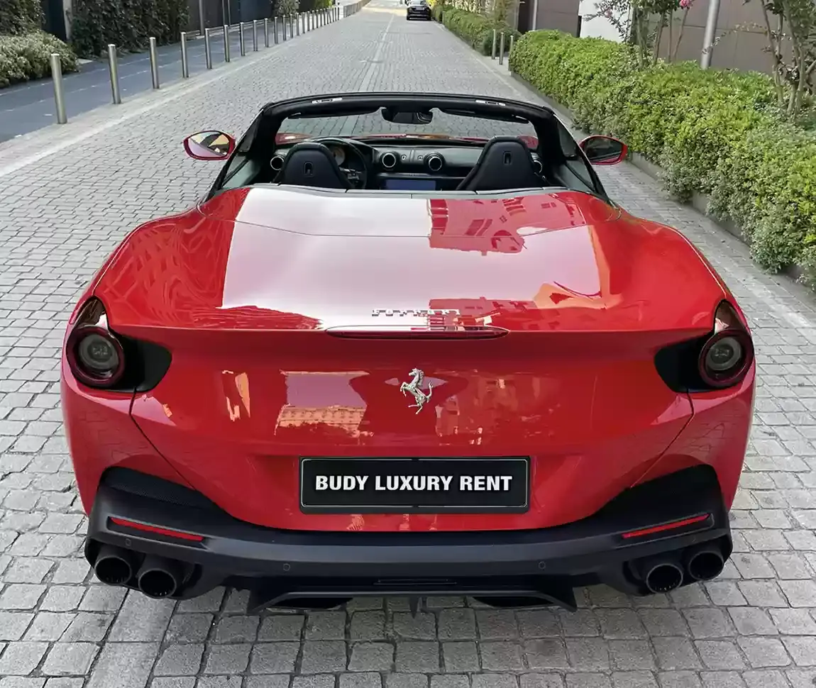 Ferrari Portofino M 2023, side profile — Marbella Luxury Car Rental, Marbella. The Ferrari Portofino M sits in the fleet as the four-seat convertible option among the…