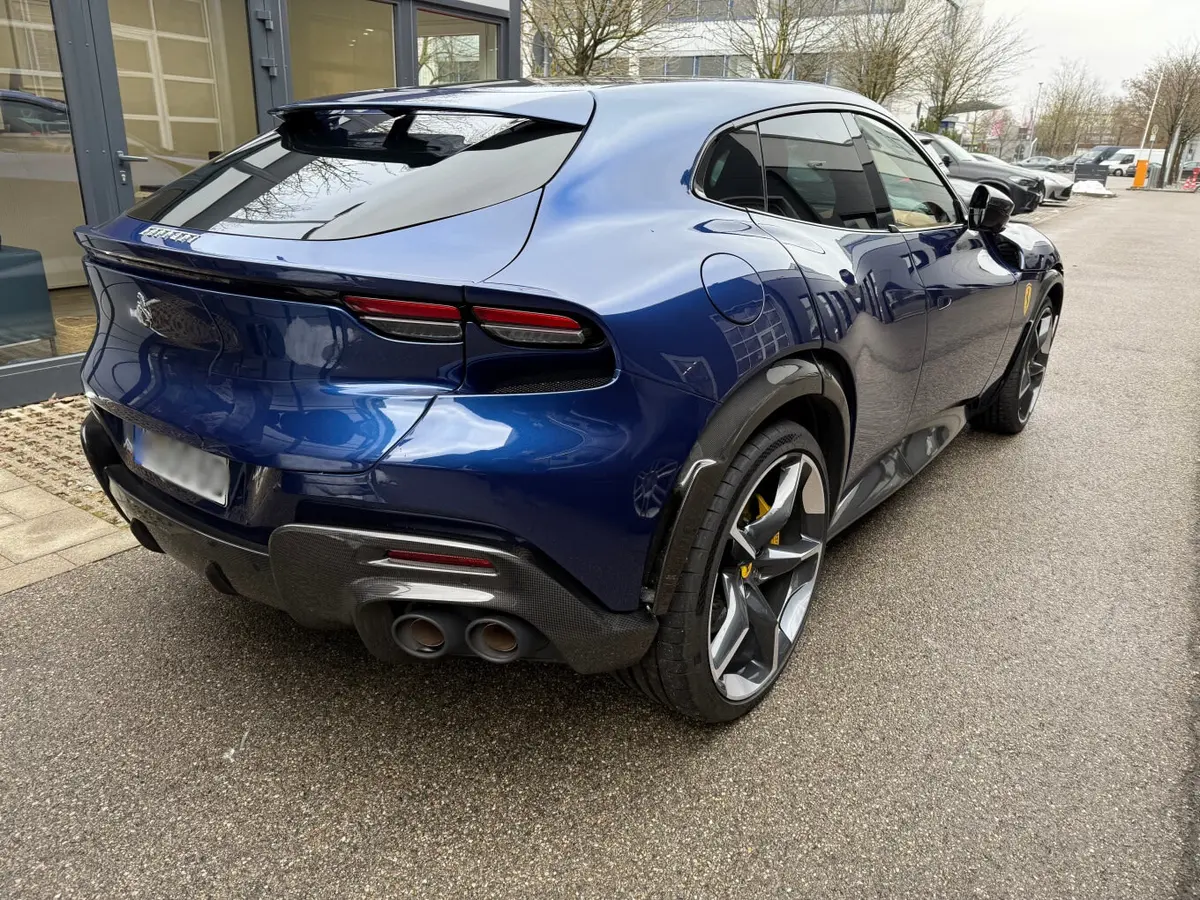 Ferrari Purosangue 2024, exterior — Marbella Luxury Car Rental, Marbella. The Ferrari Purosangue is the maker's first car with five seats, and that changes what…