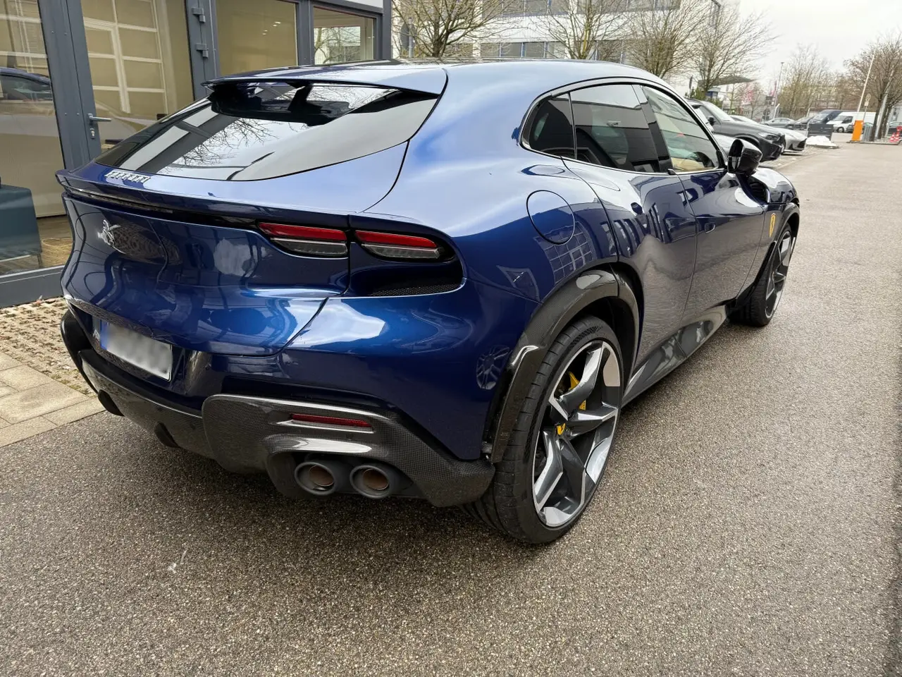 Ferrari Purosangue 2024, exterior — Marbella Luxury Car Rental, Marbella. The Ferrari Purosangue is the maker's first car with five seats, and that changes what…