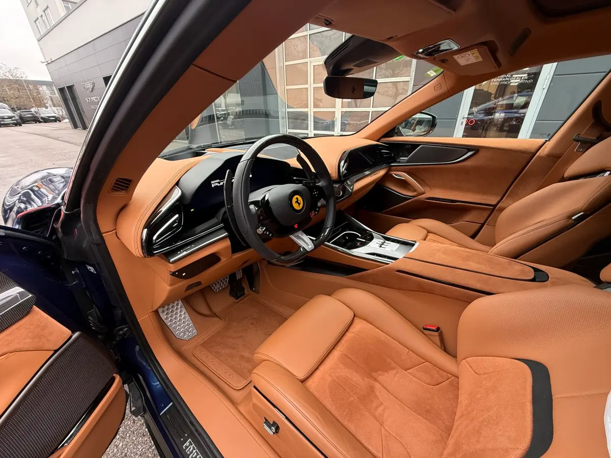 Ferrari Purosangue 2024, rear view — Marbella Luxury Car Rental, Marbella. The Ferrari Purosangue is the maker's first car with five seats, and that changes what…