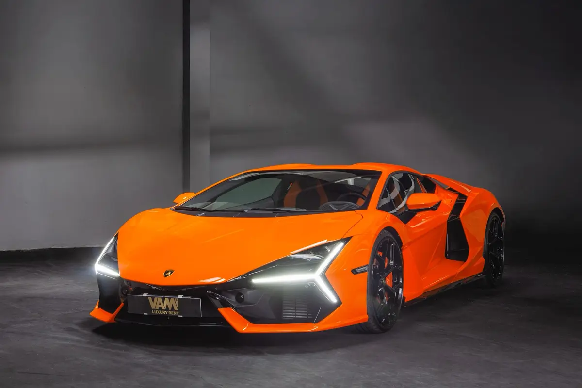 Lamborghini Revuelto 2026, front view — Marbella Luxury Car Rental, Marbella. The Lamborghini Revuelto is Lamborghini's first V12 hybrid, and the number that matters…