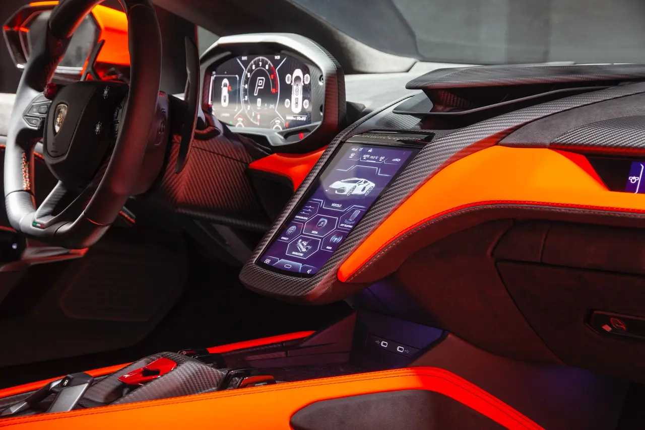 Lamborghini Revuelto 2026, dashboard — Marbella Luxury Car Rental, Marbella. The Lamborghini Revuelto is Lamborghini's first V12 hybrid, and the number that matters…