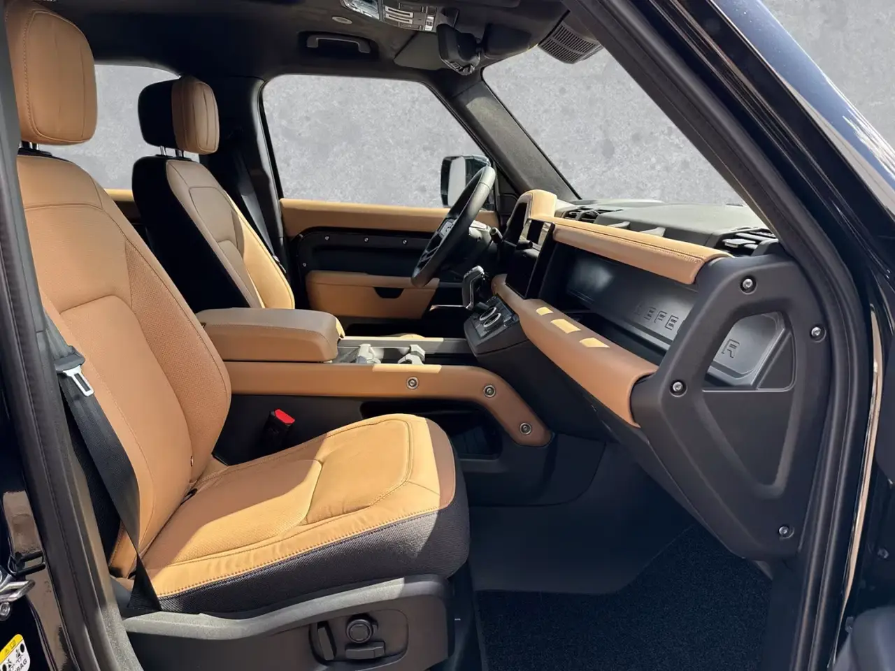 Land Rover Defender 2024, front view — Marbella Luxury Car Rental, Marbella. The 2024 Land Rover Defender pairs 400 hp with genuine seven-seat capacity, which changes…