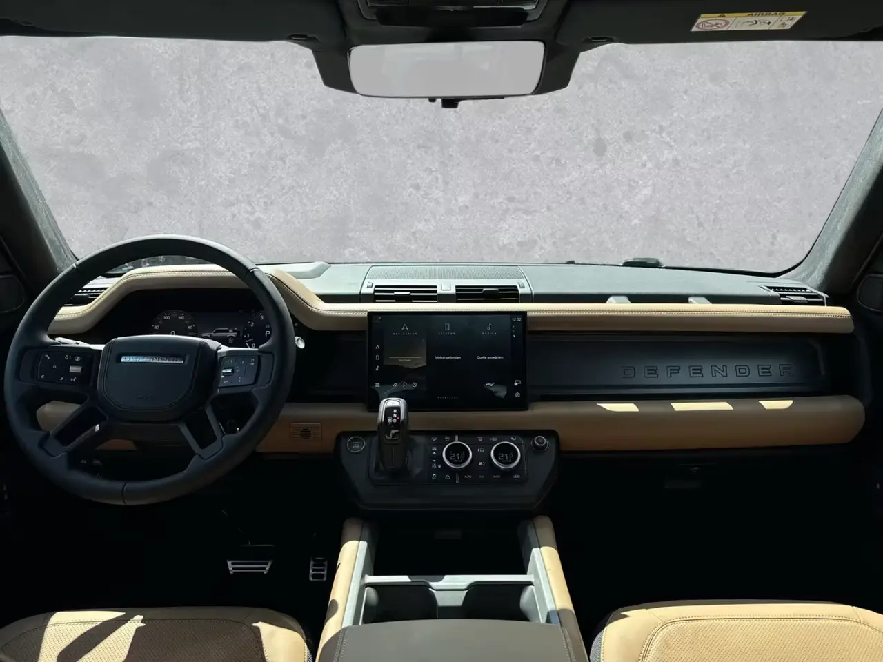Land Rover Defender 2024, rear view — Marbella Luxury Car Rental, Marbella. The 2024 Land Rover Defender pairs 400 hp with genuine seven-seat capacity, which changes…
