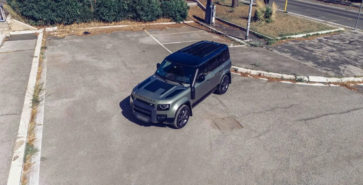 Land Rover Defender X-Dynamic 7 seater 2024, rear view — Marbella Luxury Car Rental, Marbella. The 2024 Land Rover Defender X-Dynamic seats seven and puts out 300 hp, which in practice…