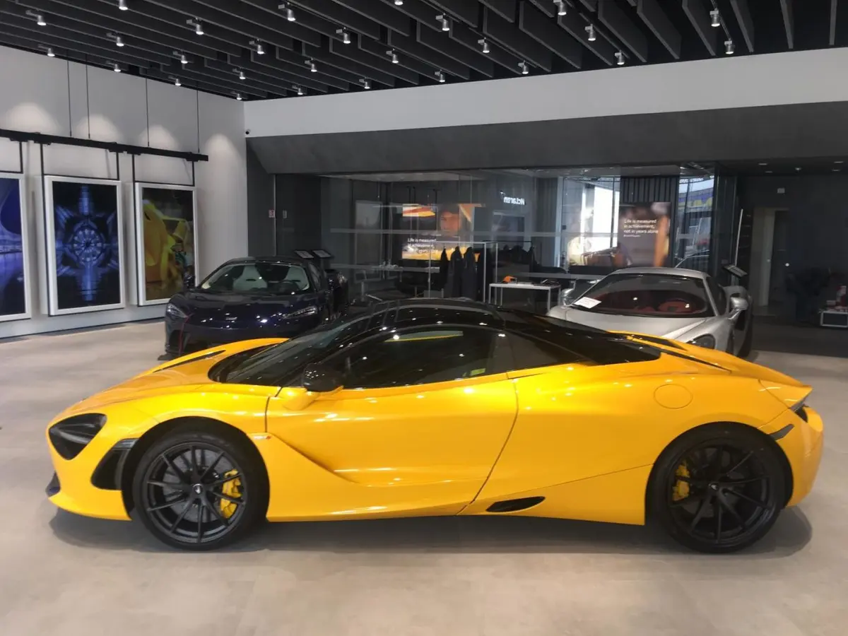 McLaren 720S Spider 2022, rear view — Marbella Luxury Car Rental, Marbella. The McLaren 720S Spider carries its 720 hp with the kind of directness that makes a…