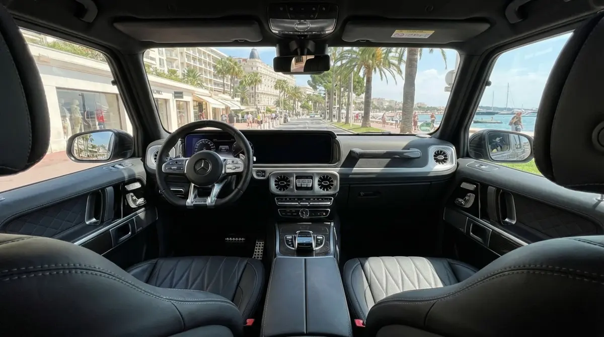 Mercedes Benz G63 2023, interior — Marbella Luxury Car Rental, Marbella. The Mercedes Benz G63 keeps the upright, slab-sided silhouette that has defined the…