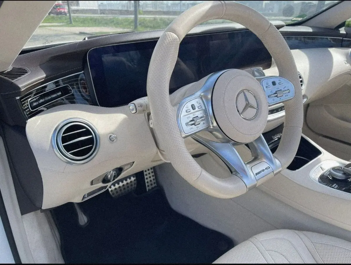 Mercedes Benz S560 Cabrio 2021, exterior — Marbella Luxury Car Rental, Marbella. The Mercedes Benz S560 Cabrio pairs a 469 hp V8 with the size and weight of a full…