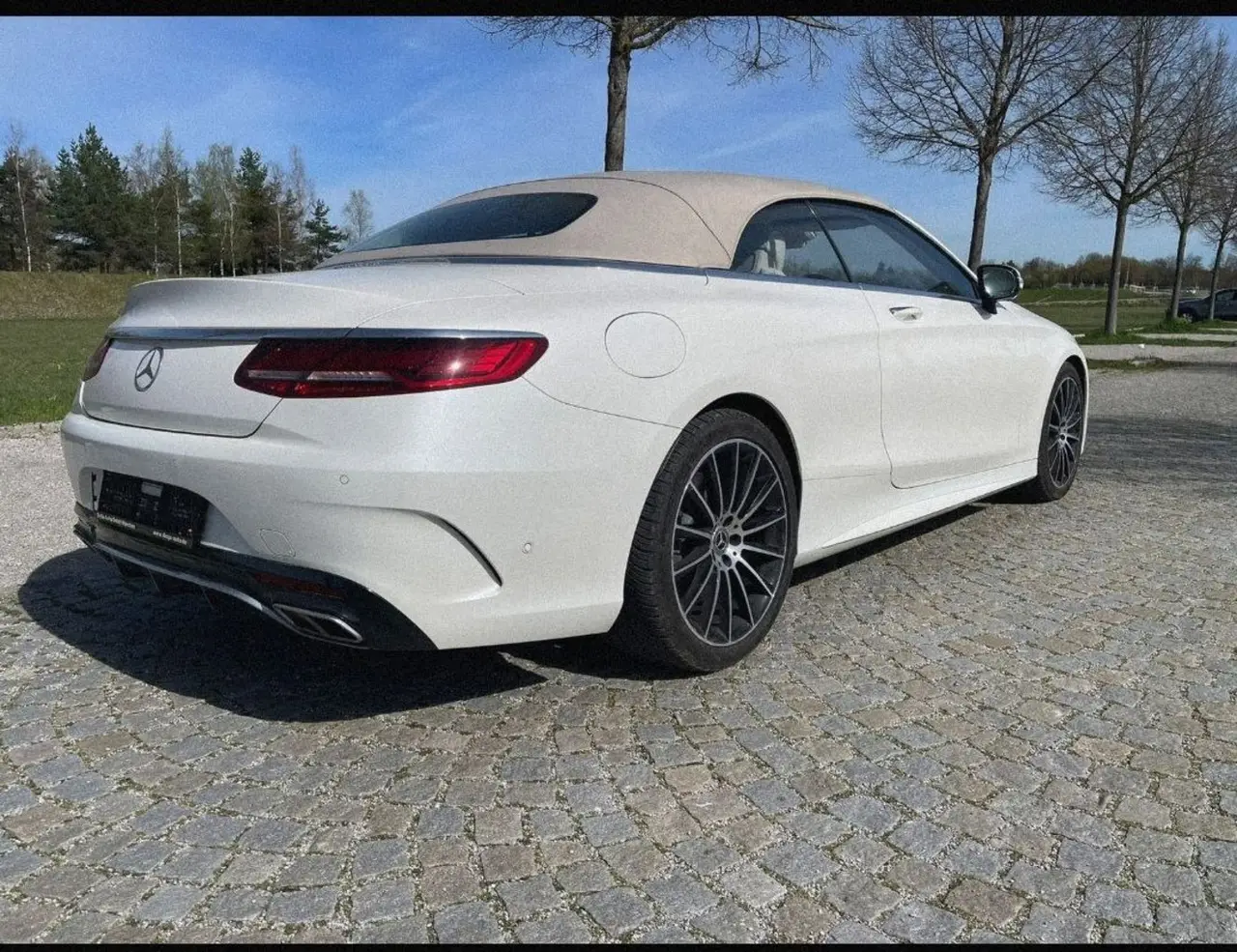 Mercedes Benz S560 Cabrio 2021, rear view — Marbella Luxury Car Rental, Marbella. The Mercedes Benz S560 Cabrio pairs a 469 hp V8 with the size and weight of a full…
