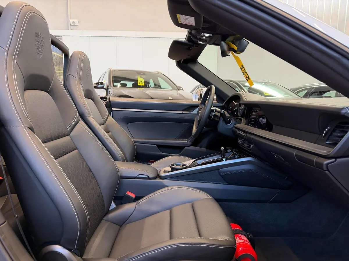 Porsche 911 Carrera S Cabrio (992) 2025, exterior — Marbella Luxury Car Rental, Marbella. The 2025 Porsche 911 Carrera S Cabrio (992) is the kind of car that rewards a good road…