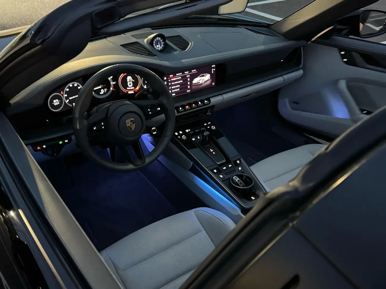 Porsche 911 Targa 2025, exterior — Marbella Luxury Car Rental, Marbella. The 2025 Porsche 911 Targa carries 541 hp through the familiar Targa silhouette, with the…