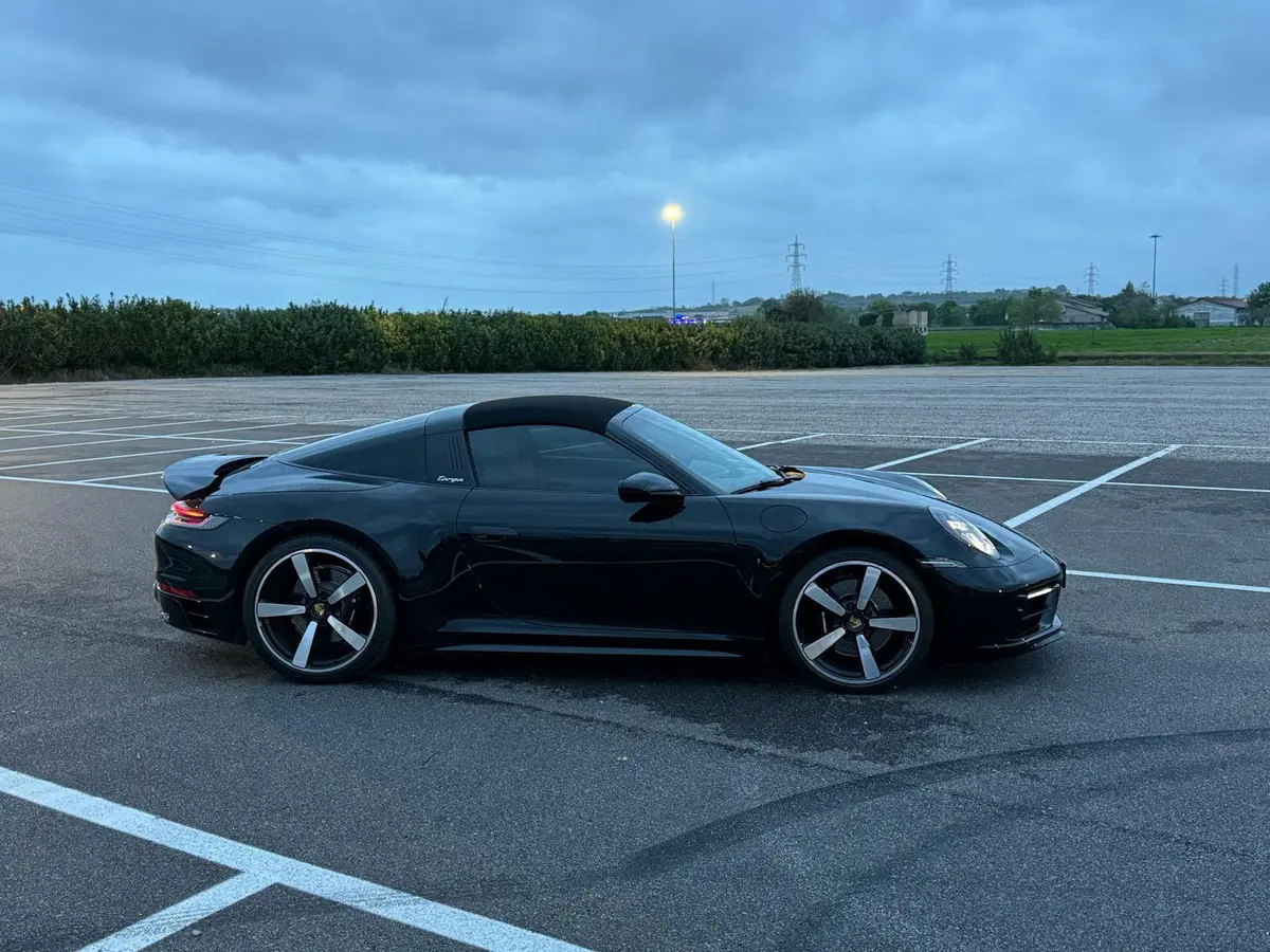 Porsche 911 Targa 2025, front view — Marbella Luxury Car Rental, Marbella. The 2025 Porsche 911 Targa carries 541 hp through the familiar Targa silhouette, with the…