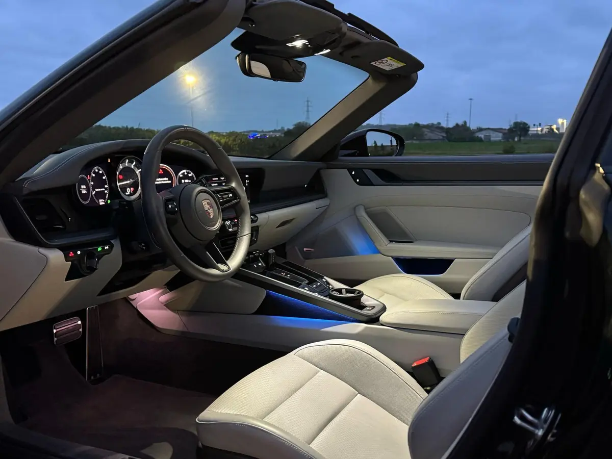 Porsche 911 Targa 2025, rear view — Marbella Luxury Car Rental, Marbella. The 2025 Porsche 911 Targa carries 541 hp through the familiar Targa silhouette, with the…