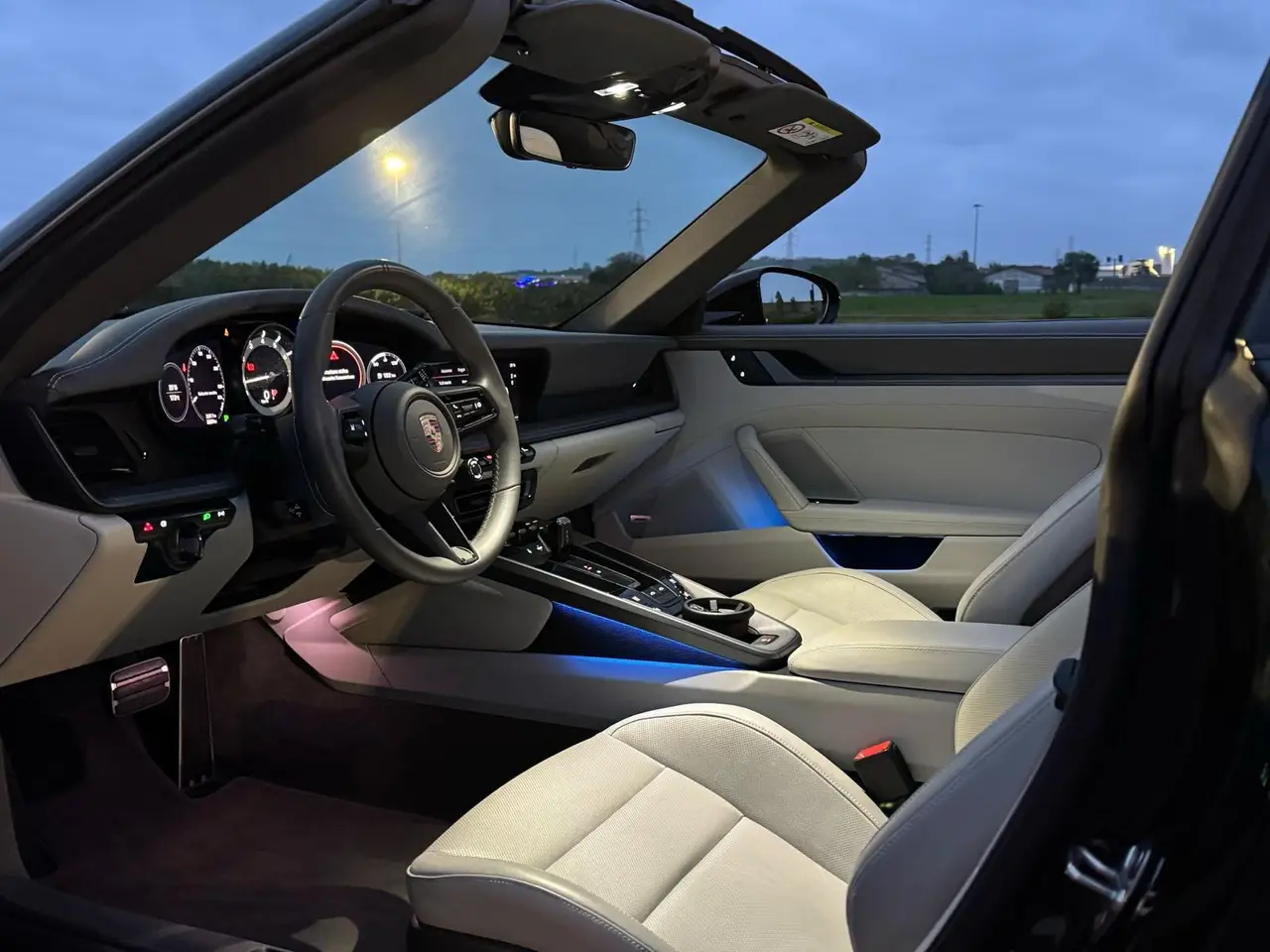 Porsche 911 Targa 2025, rear view — Marbella Luxury Car Rental, Marbella. The 2025 Porsche 911 Targa carries 541 hp through the familiar Targa silhouette, with the…