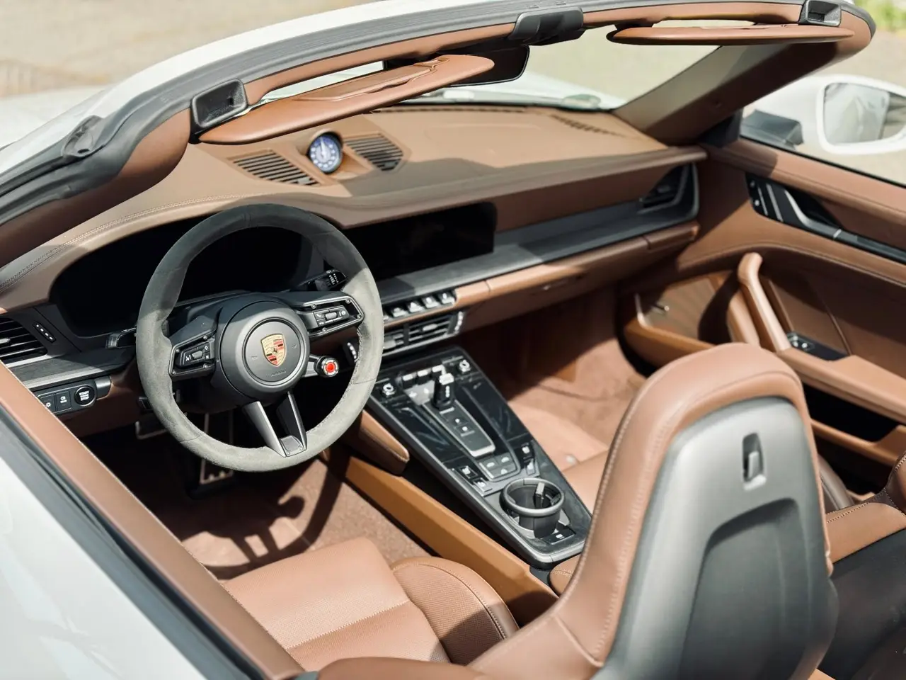Porsche 992.2 Carrera 4 GTS Cabrio 2025, interior — Marbella Luxury Car Rental, Marbella. The 992.2 Carrera 4 GTS Cabrio sits at the point where daily usability and real pace…