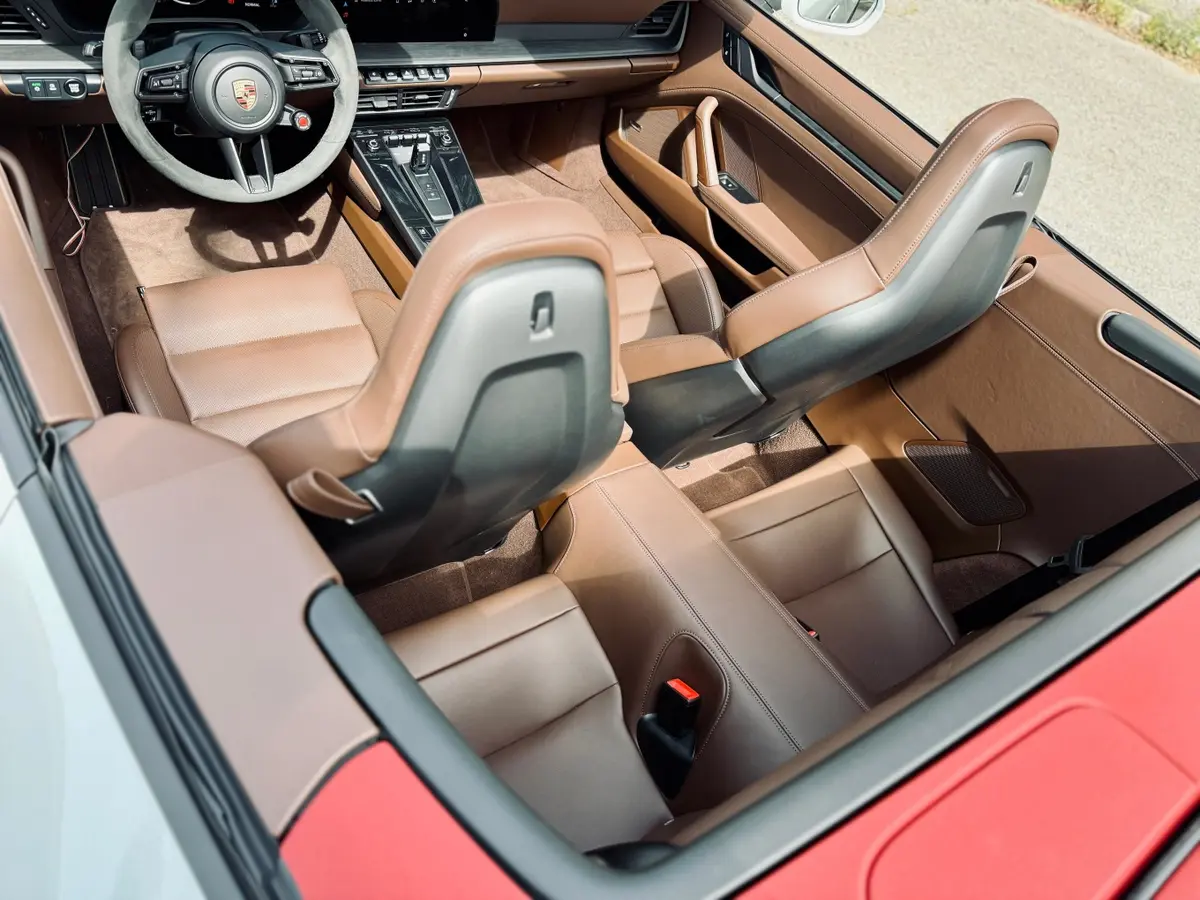 Porsche 992.2 Carrera 4 GTS Cabrio 2025, side profile — Marbella Luxury Car Rental, Marbella. The 992.2 Carrera 4 GTS Cabrio sits at the point where daily usability and real pace…