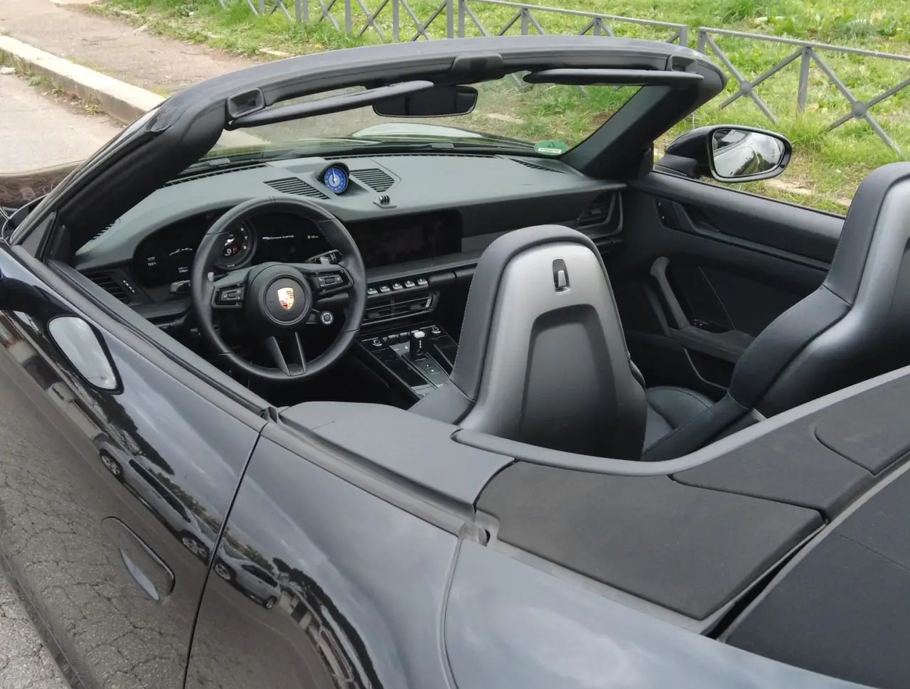 Porsche 992 Carrera 4 GTS Cabrio 2024, interior — Marbella Luxury Car Rental, Marbella. The 992-generation Carrera 4 GTS Cabrio sits at the point where the 911 range gets…