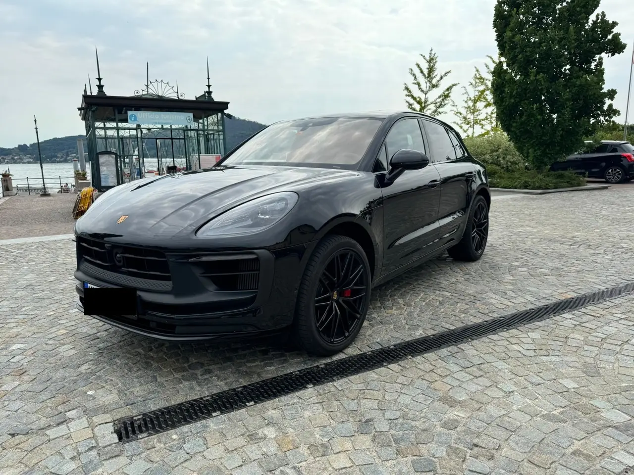 Porsche Macan GTS 2024, rear view — Marbella Luxury Car Rental, Marbella. The 2024 Porsche Macan GTS pairs 440 hp with a five-seat SUV body, which puts it in an…